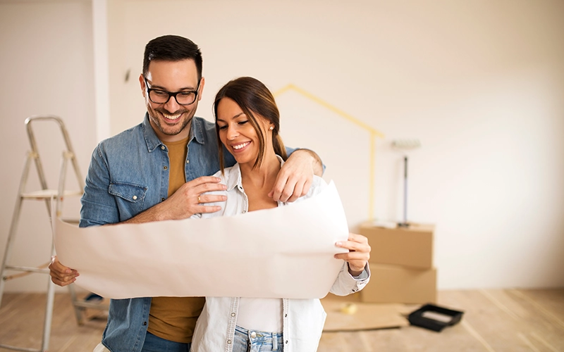 couple with blueprint